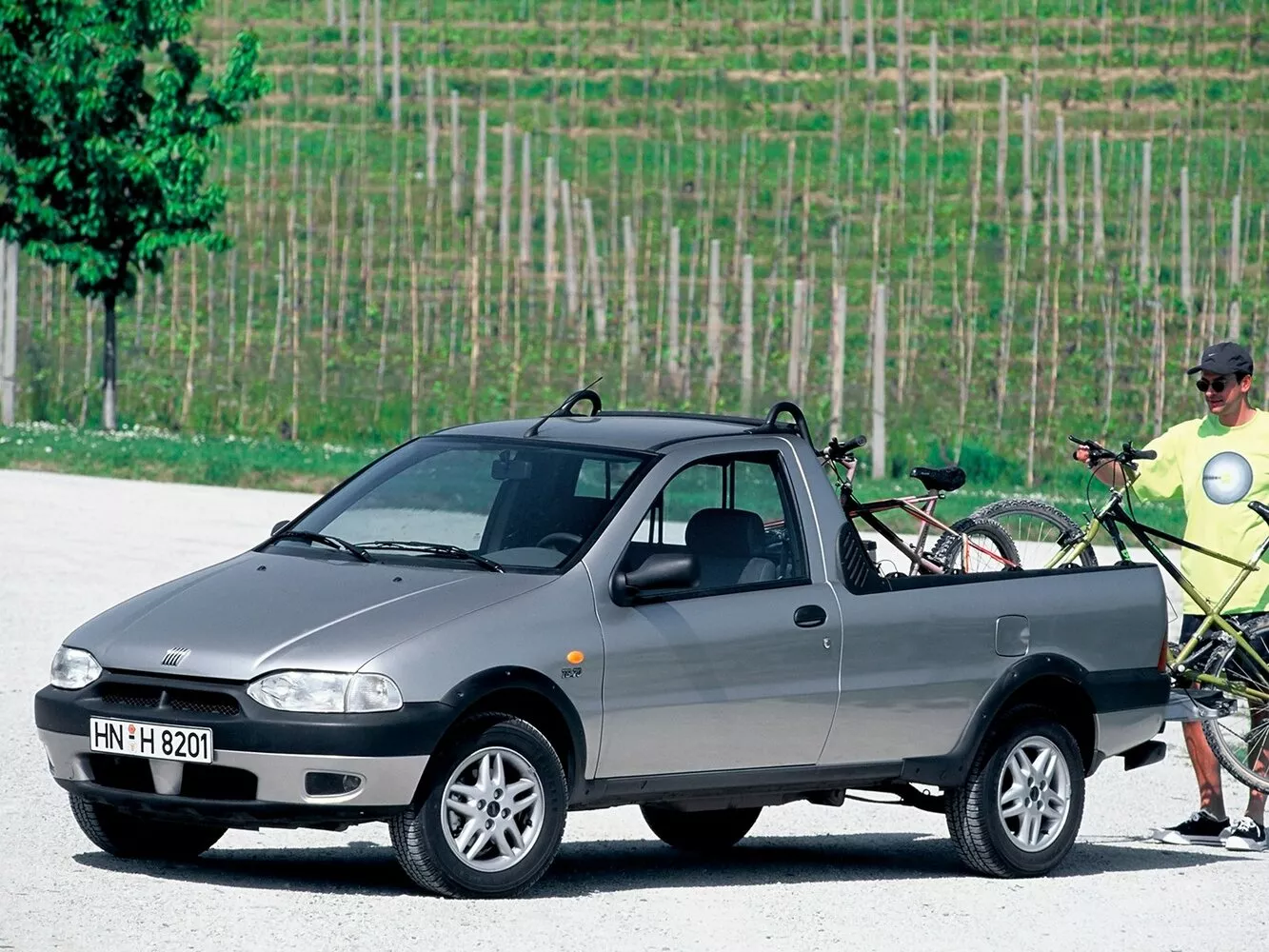 Фото сбоку Fiat Strada   1996 -  2024 
                                            