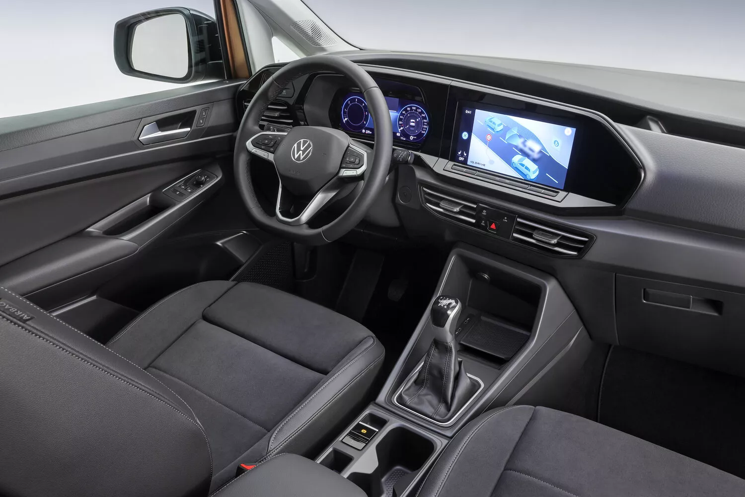 Фото салона спереди Volkswagen Caddy Maxi V 2020 -  2024 
                                            